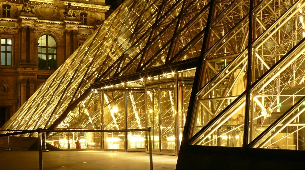 paris louvre france museum 163895 163895 Stunning night view of the illuminated glass pyramid at the Louvre Museum in Paris, France.